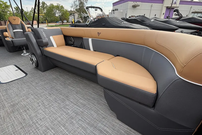 Slide: The Image of Luxurious seating on 2026 Viaggio Z24U boat, featuring tan and gray upholstery. - 13