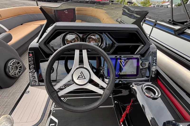 Slide: The Image of 2026 Viaggio Z24U boat dashboard with steering wheel and modern controls. - 18