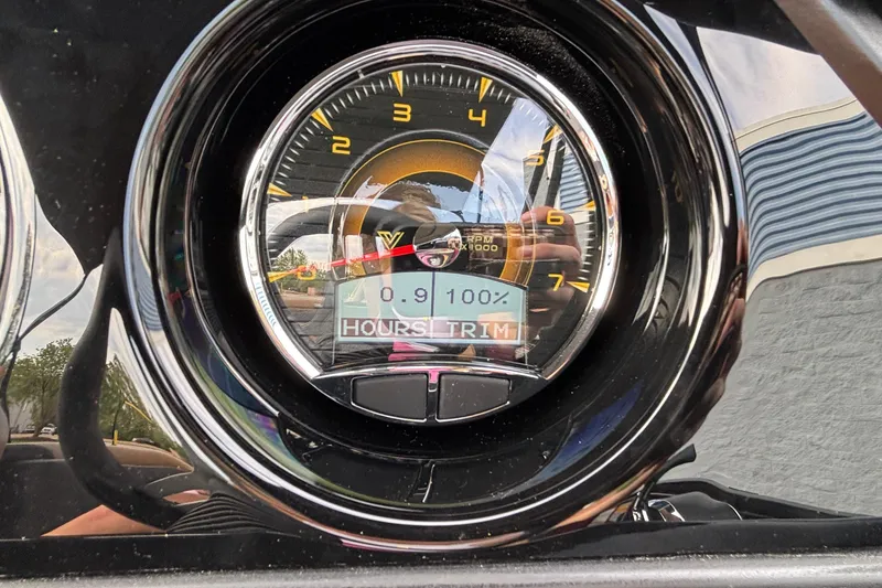 Slide: The Image of Close-up of Viaggio Z24U 2026 dashboard gauge displaying RPM and trim settings. - 20