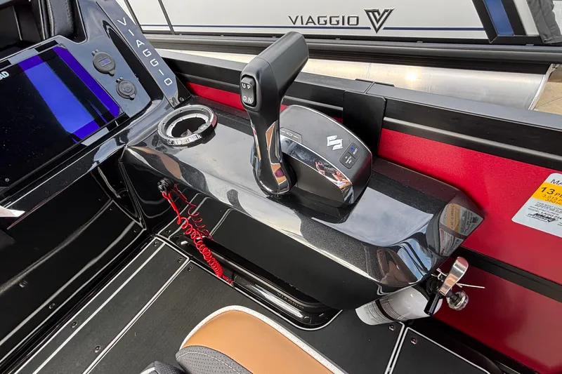 Slide: The Image of Viaggio Z24U 2026 boat console with control lever and cup holder. - 21
