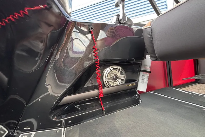 Slide: The Image of Interior of 2026 Viaggio Z24U with speaker and red cord detail. - 22