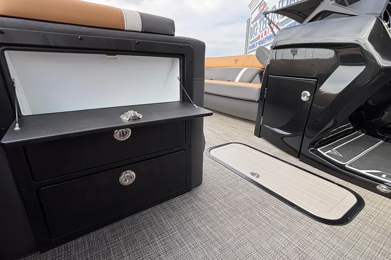 Slide: The Image of Interior of 2026 Viaggio Z24U boat with storage compartments and seating. - 24