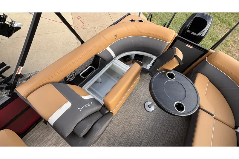 Slide: The Image of Luxurious interior of 2026 Viaggio Z24U boat with tan and gray seating, round table. - 26