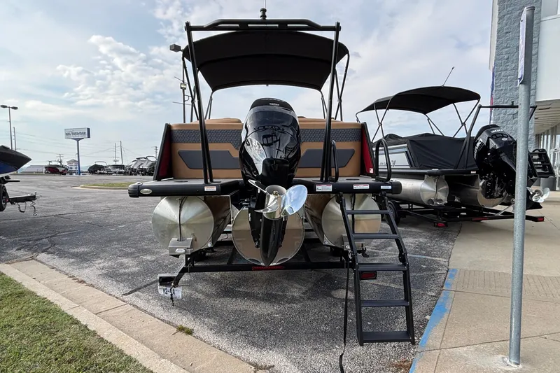 Slide: The Image of 2026 Viaggio Z24U pontoon boat with outboard motor and ladder, displayed outdoors. - 28