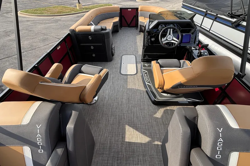 Slide: The Image of Luxurious 2026 Viaggio Z24U pontoon boat interior with plush seating and modern dashboard. - 9
