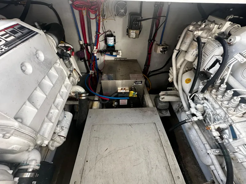 Slide: The Image of Engine room of 2006 Chris-Craft 43 Roamer with visible machinery and wiring. - 16