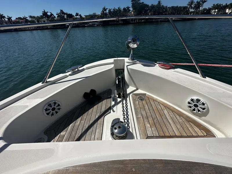 Slide: The Image of Bow view of 2006 Chris-Craft 43 Roamer yacht with teak decking and anchor chain. - 46