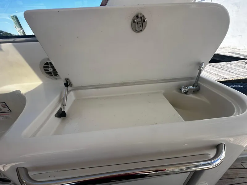 Slide: The Image of Open storage compartment on 2006 Chris-Craft 43 Roamer yacht. - 6