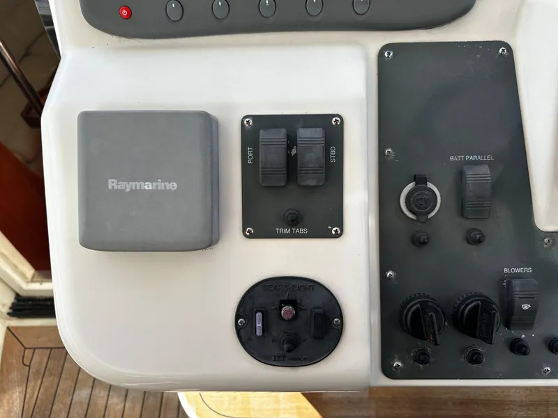 Slide: The Image of Control panel of a 2006 Chris-Craft 43 Roamer with Raymarine equipment. - 13