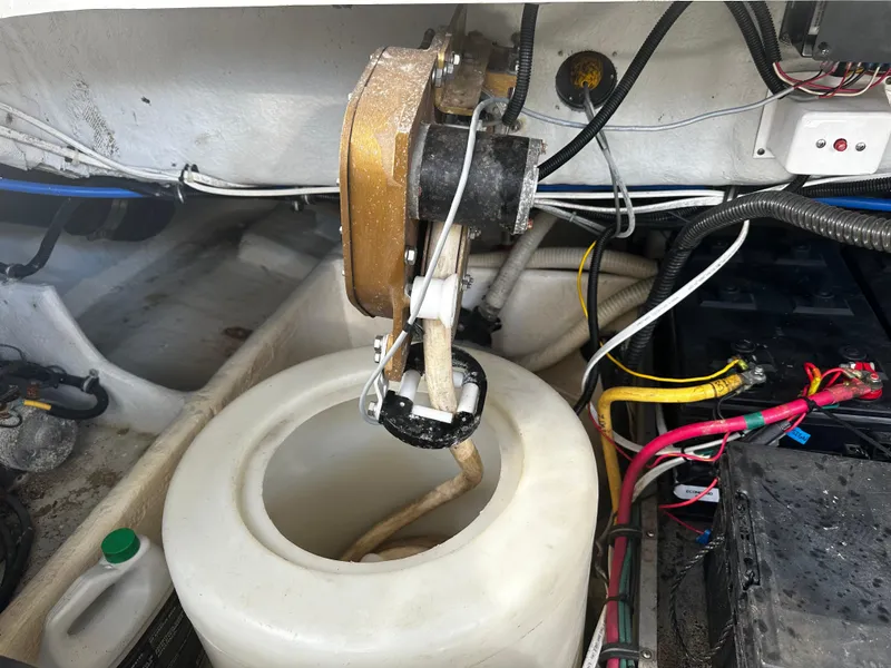 Slide: The Image of Engine compartment of a 2006 Chris-Craft 43 Roamer with visible wiring and components. - 19