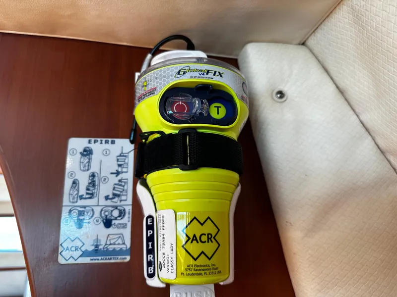 Slide: The Image of Open wooden cabinet on 2006 Chris-Craft 43 Roamer with bags inside. - 39