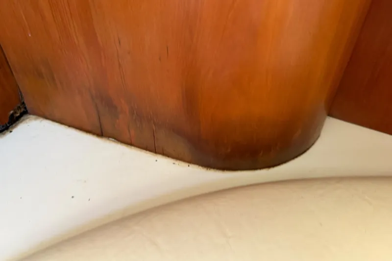 Slide: The Image of Wooden interior detail of a 2006 Chris-Craft Roamer 40 boat. - 44