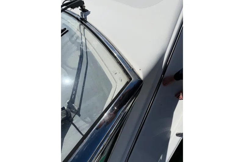 Slide: The Image of Close-up of 2006 Chris-Craft Roamer 40 boat windshield and deck details. - 33