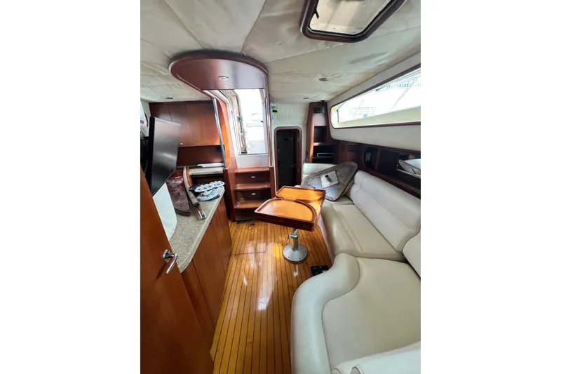 Slide: The Image of Luxurious interior of 2006 Chris-Craft Roamer 40 yacht with elegant wood finishes. - 20