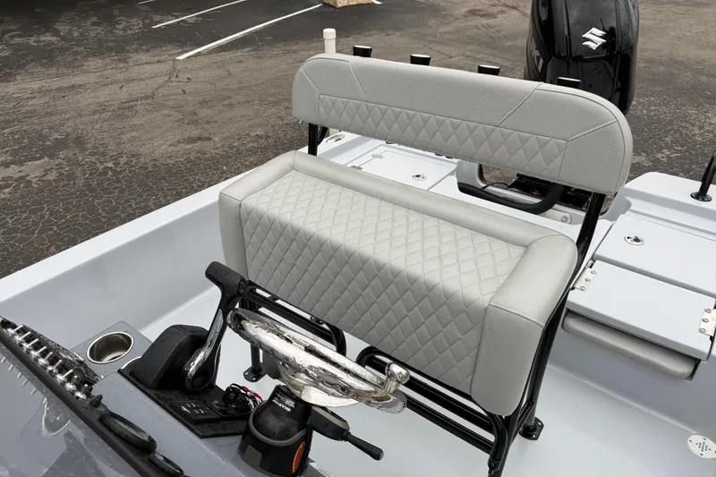 Slide: The Image of 2026 Blazer Bay 2220 Fisherman boat seat with diamond-stitched upholstery and control panel. - 13