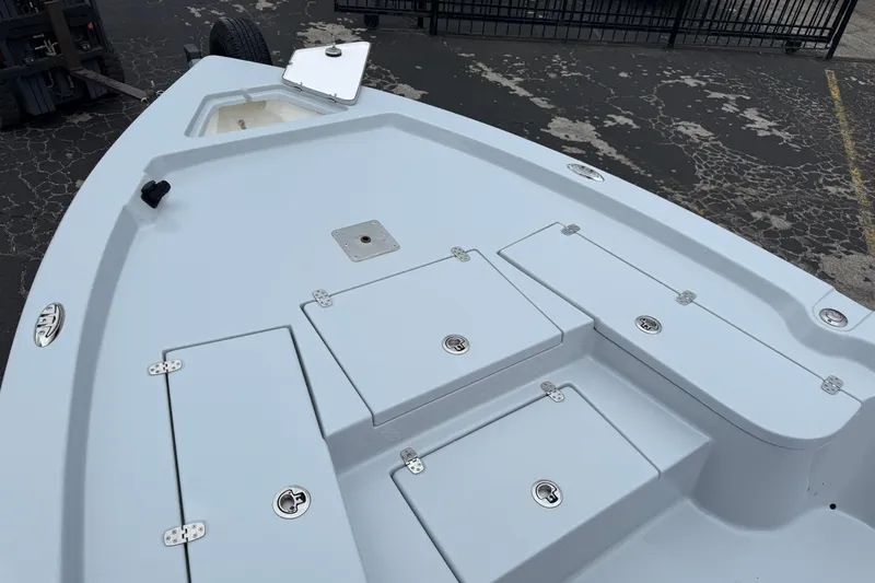 Slide: The Image of 2026 Blazer Bay 2220 Fisherman boat deck with storage compartments. - 24