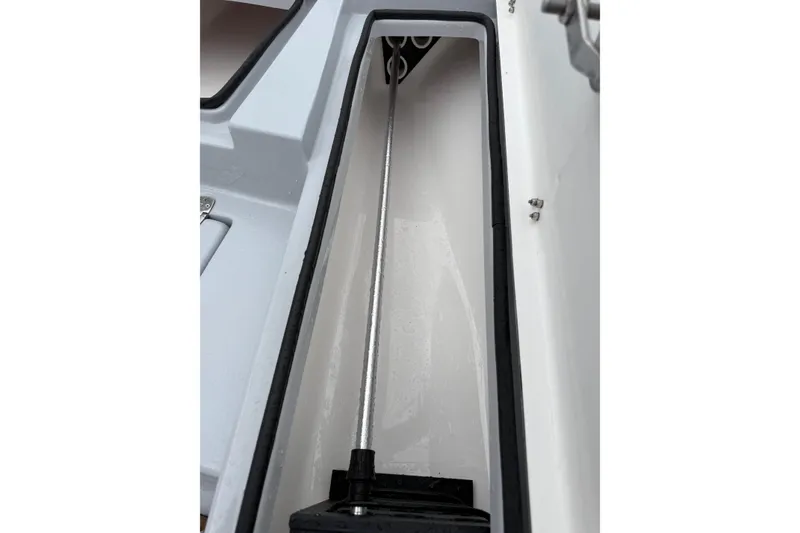 Slide: The Image of 2026 Blazer Bay 2220 Fisherman boat storage compartment detail. - 28