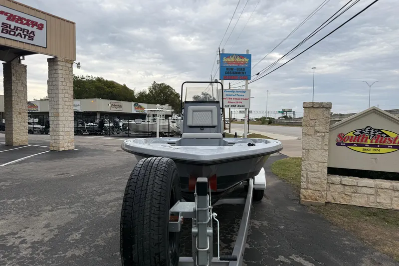 Slide: The Image of 2026 Blazer Bay 2220 Fisherman boat on trailer at South Austin Marine dealership. - 5
