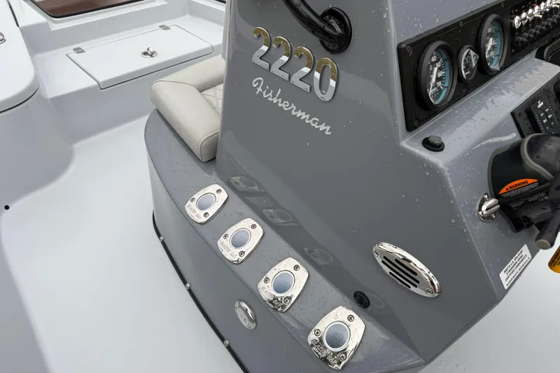Slide: The Image of 2026 Blazer Bay 2220 Fisherman boat console with controls and gauges. - 7