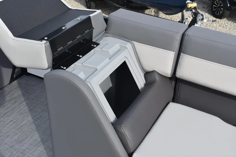 Slide: The Image of Interior seating of 2026 Lowe LS 210 WT boat with storage compartment. - 10