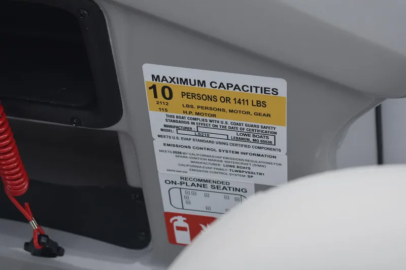 Slide: The Image of Capacity label on 2026 Lowe LS 210 WT boat, showing maximum 10 persons or 1411 lbs. - 13