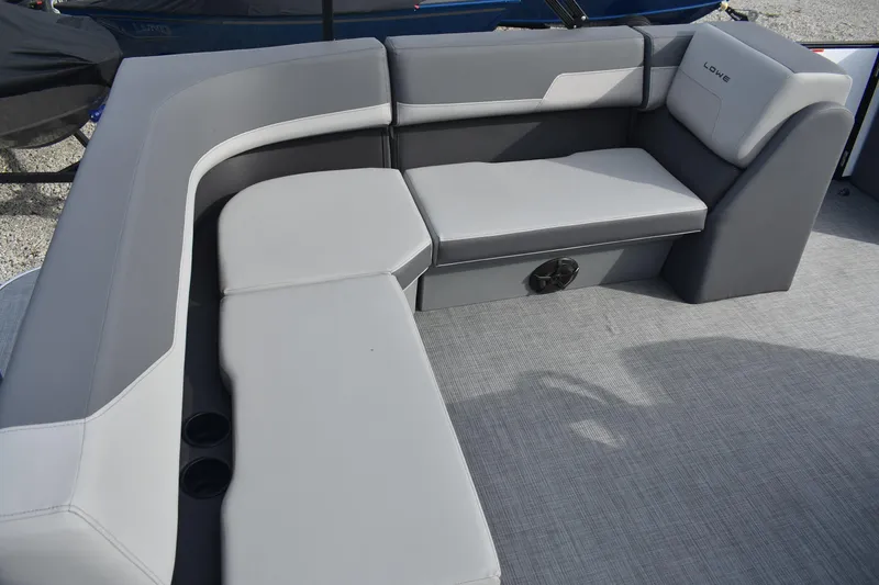 Slide: The Image of 2026 Lowe LS 210 WT boat interior with gray cushioned seating. - 14