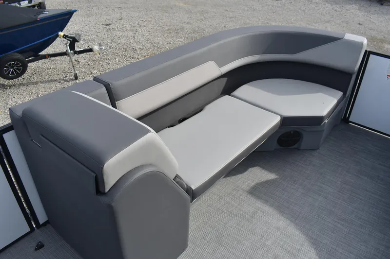 Slide: The Image of 2026 Lowe LS 210 WT boat interior with gray seating and modern design. - 9