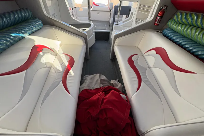 Slide: The Image of Interior of 2007 Nordic Boats 28 Heat with stylish white and red seating. - 16