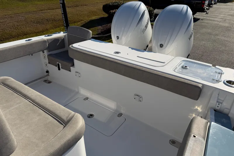 Slide: The Image of 2025 Sea Hunt Gamefish 27 boat with forward seating and twin engines. - 15