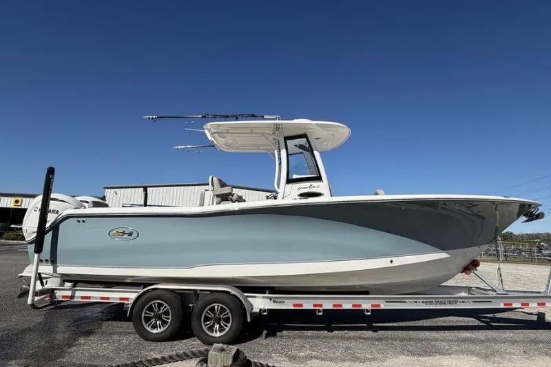 Slide: The Image of 2025 Sea Hunt Gamefish 27 boat with Yamaha engines at Marine Service Center. - 2