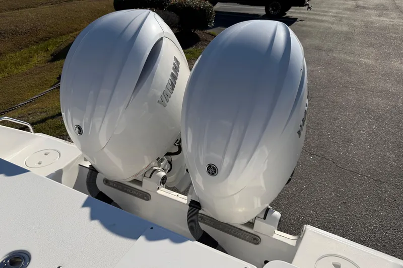 Slide: The Image of Twin Yamaha outboard engines on 2025 Sea Hunt Gamefish 27 boat. - 26
