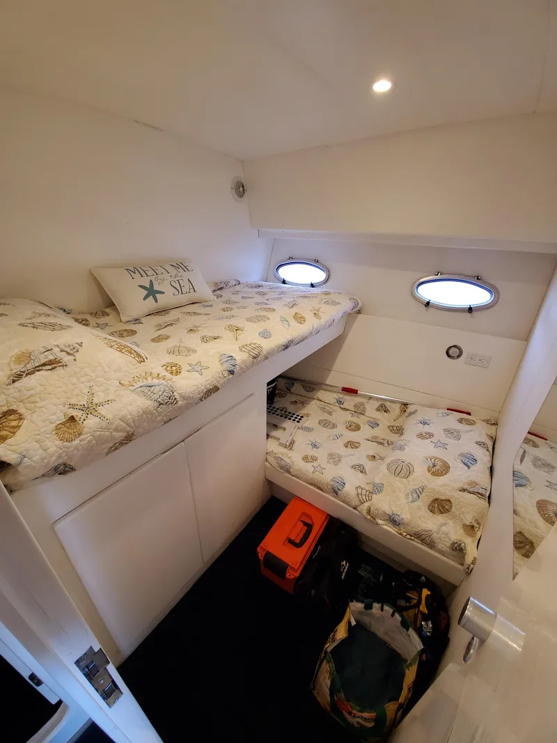 Slide: The Image of Cozy cabin interior of 1993 Giorgi 46 yacht with twin beds and nautical decor. - 19