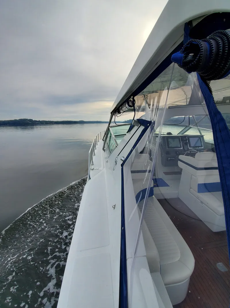 Slide: The Image of Luxury Giorgi 46 yacht cruising on calm waters, showcasing sleek design and comfortable seating. - 46