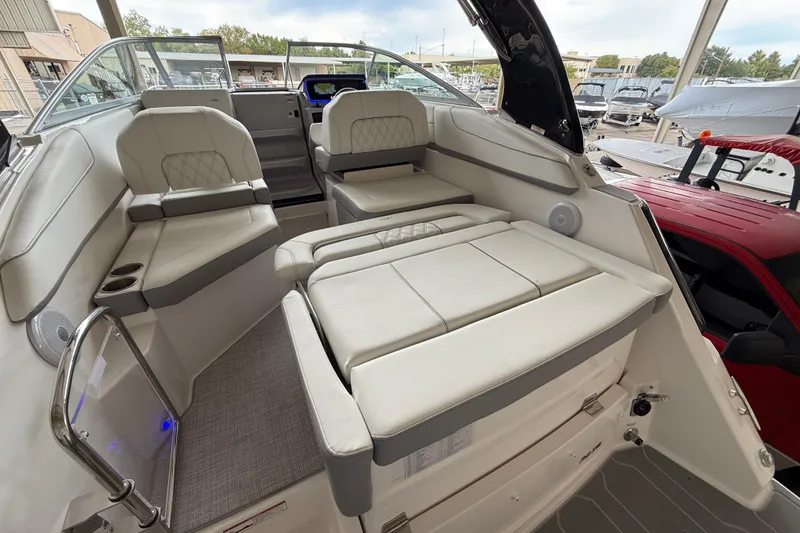 Slide: The Image of 2026 Regal 26 XO boat interior with luxurious seating and modern design. - 12