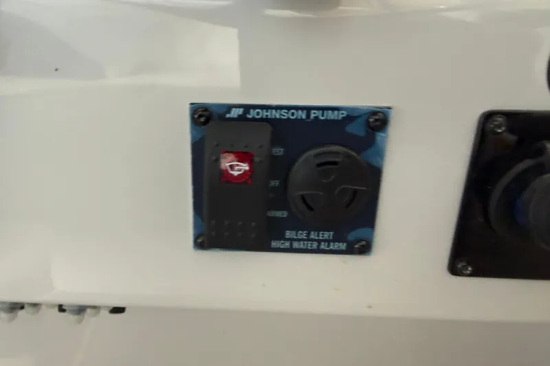 Slide: The Image of Control panel of Johnson Pump bilge alert on 2026 Regal 26 XO boat. - 27