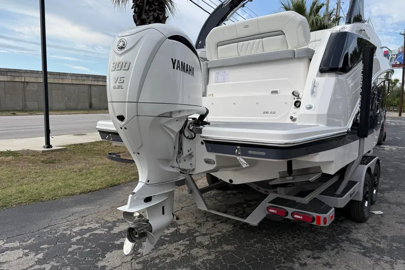 Slide: The Image of 2026 Regal 26 XO boat with Yamaha 300 V6 engine on trailer. - 6