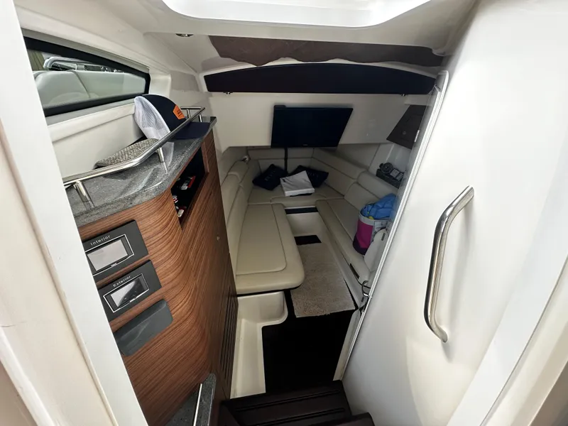 Slide: The Image of Interior cabin of 2022 Boston Whaler 350 Realm, featuring modern design and comfortable seating. - 37