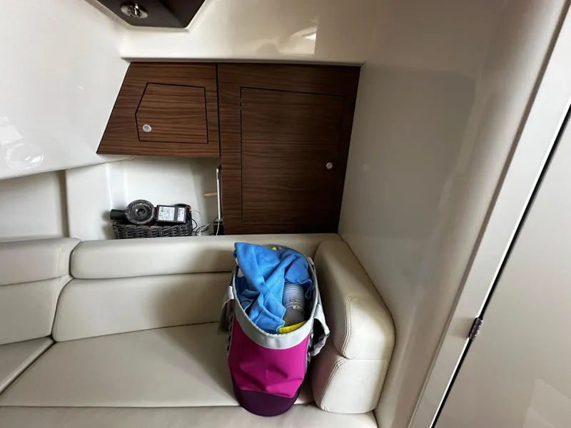 Slide: The Image of Interior of 2022 Boston Whaler 350 Realm with seating and storage compartments. - 40