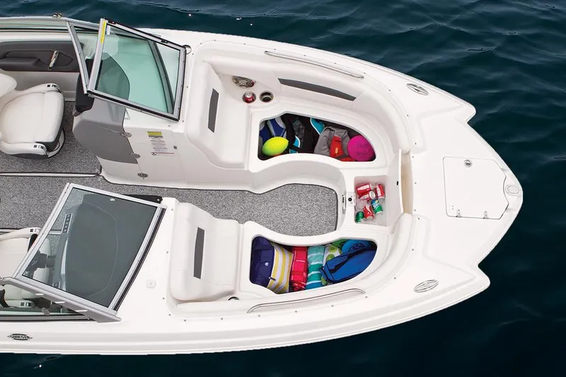 Slide: The Image of Manufacturer Provided Image: Couple enjoying a meal on a 2015 Chaparral 244 Sunesta boat. - 22