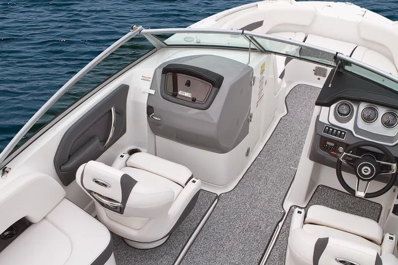 Slide: The Image of Manufacturer Provided Image: 2015 Chaparral 244 Sunesta boat dashboard and steering wheel. - 26