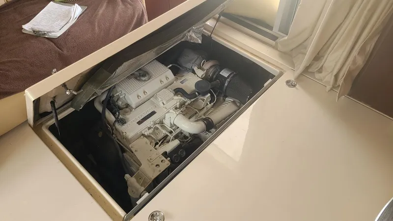 Slide: The Image of 2006 Sea Ray 44 Sedan Bridge engine compartment, showcasing the boat's powerful engine. - 26