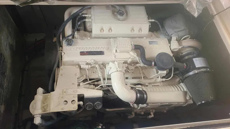 Slide: The Image of Engine of a 2006 Sea Ray 44 Sedan Bridge boat, showcasing intricate mechanical components. - 27