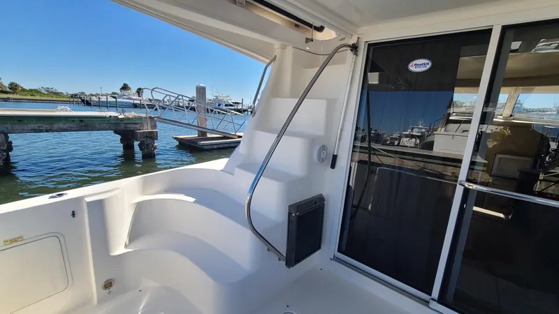 Slide: The Image of 2006 Sea Ray 44 Sedan Bridge yacht interior with dockside view. - 8