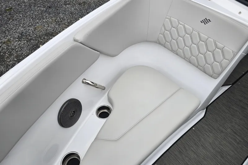 Slide: The Image of Dashboard of 2025 Four Winns H4 Freedom boat with gauges and control switches. - 21