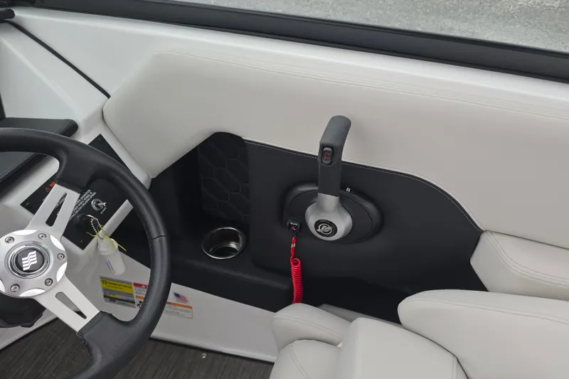 Slide: The Image of Luxurious seating area in 2025 Four Winns H4 Freedom boat, featuring sleek white upholstery. - 26