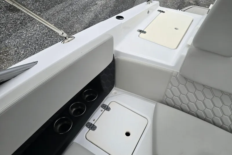 Slide: The Image of 2025 Four Winns H4 Freedom boat logo on sleek gray hull. - 38