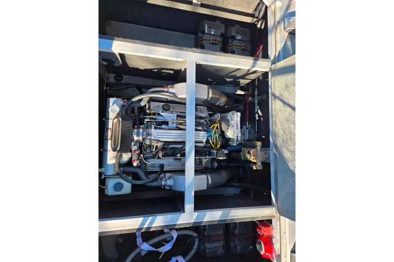 Slide: The Image of 2011 Thunderjet ALEXIS CLASSIC engine compartment with visible components and wiring. - 17