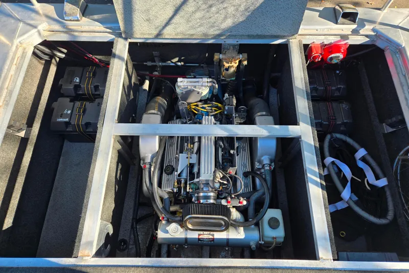 Slide: The Image of 2011 Thunderjet ALEXIS CLASSIC engine compartment with visible components and wiring. - 18