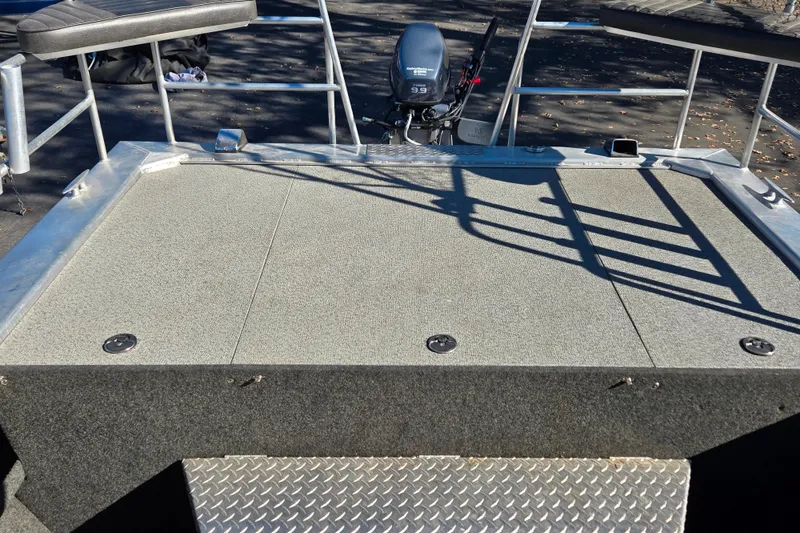 Slide: The Image of 2011 Thunderjet ALEXIS CLASSIC boat deck with motor and seating. - 4