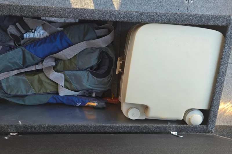 Slide: The Image of Storage compartment in 2011 Thunderjet ALEXIS CLASSIC with life jackets and portable toilet. - 6
